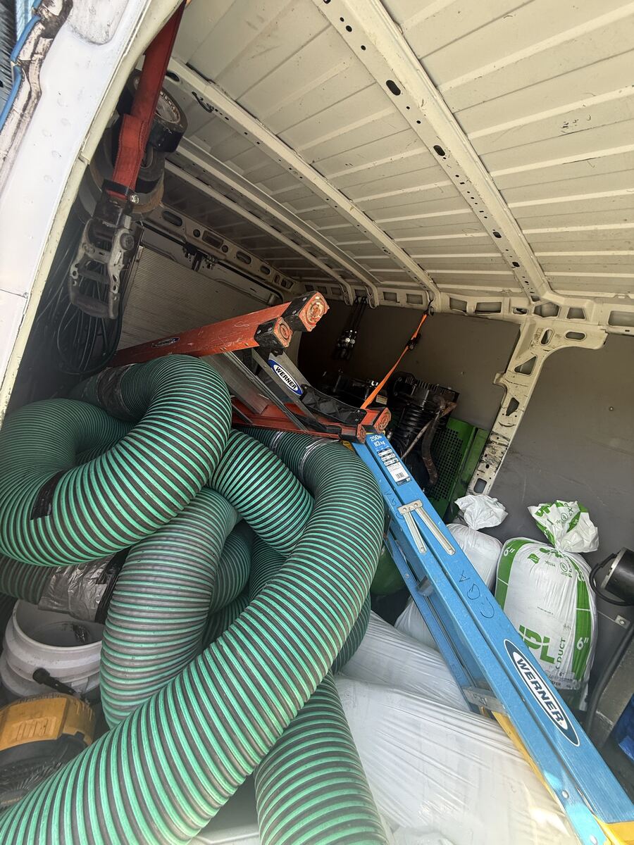 Van 1 morning, hose pile with ladders on top