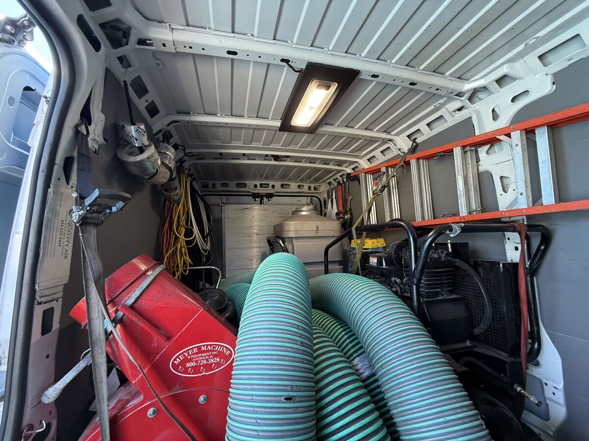 Van 3 close-out with ladder hung on the wall